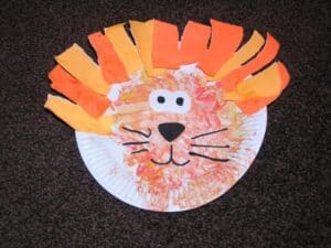 adult modelled version of the paper plate lion