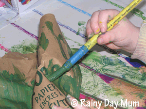 Covering all of the writing on the paper bag