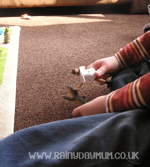 100 days of play and some imaginative play for kids with a safari on the floor