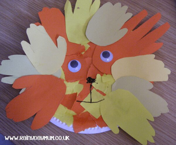 paper plate lion with handprint mane created by a preschooler