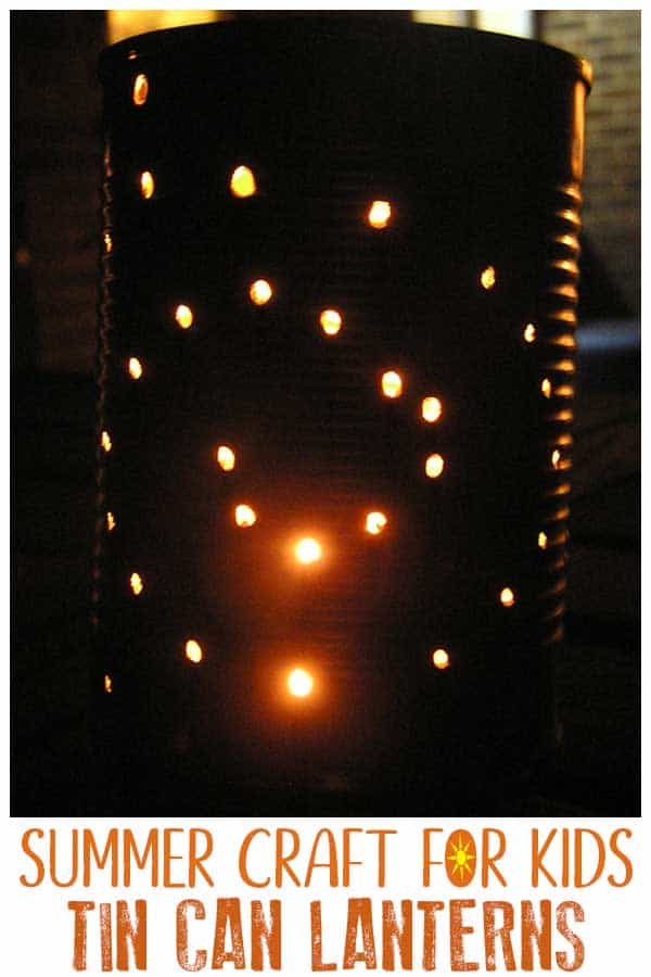 tin can lantern at night with candle inside text underneath reads summer craft for kids tin can lanterns