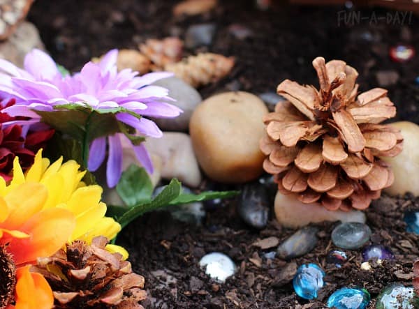 Setting up a fairy garden to bring alive the book Alive the Fairy as part of Story Book Summer on Rainy Day Mum