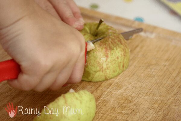 Teach practical life skills with windfall apples - practising using a knife