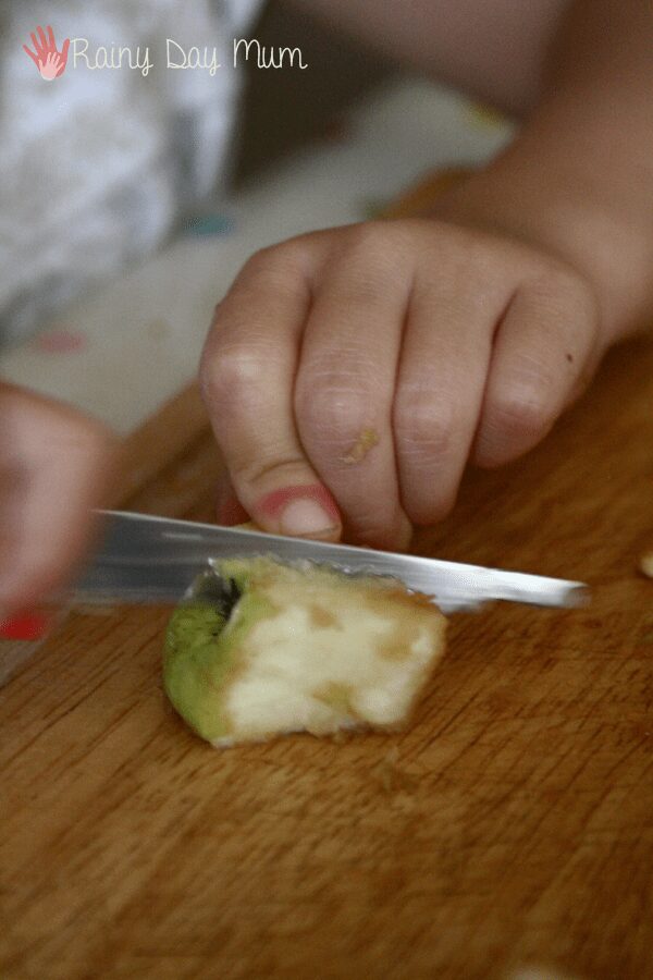 Teach practical life skills with windfall apples - practising using a knife