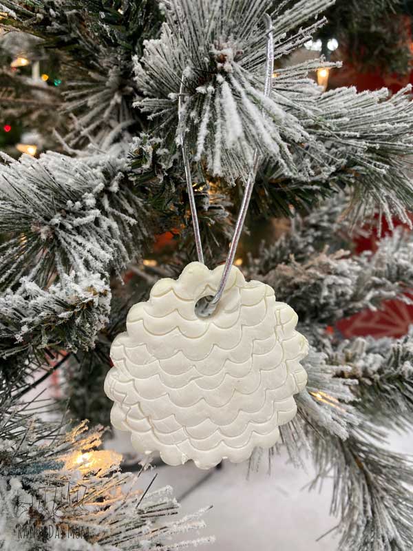 Christmas ornament hanging on the Christmas tree made by the kids with White Cornflour Clay