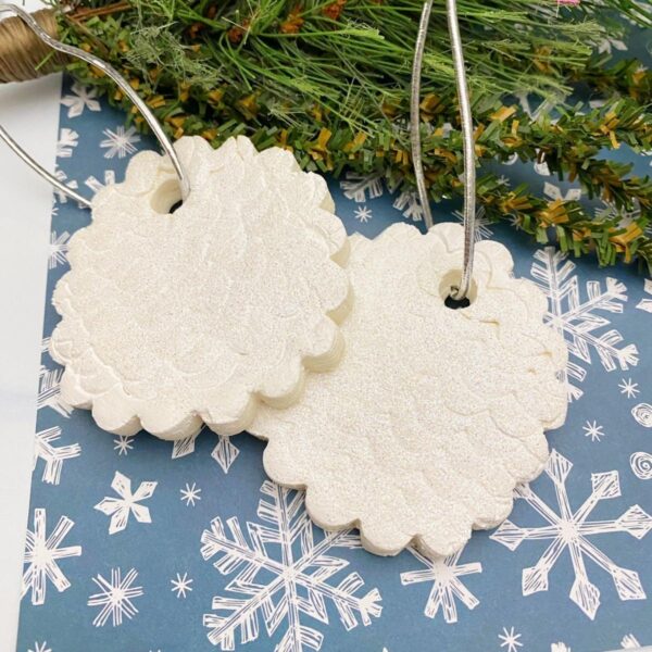 brilliant white christmas ornaments from cornstarch clay with superfine glitter added for extra festive sparkle