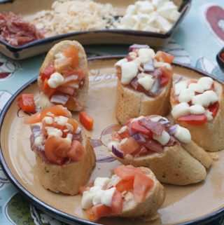 A simple healthy bruschetta recipe to make with kids ideal for those after-school hunger pains or as a simple summer meal starter to enjoy together.