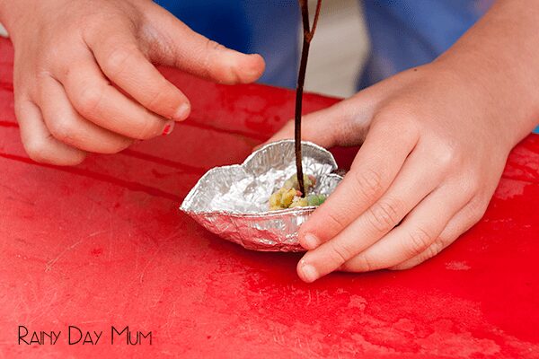 Pie Tin Boats - challenge the family this summer with this simple engineering challenge to see who can make a boat out of pie cases and get it to go the fastest across the water.