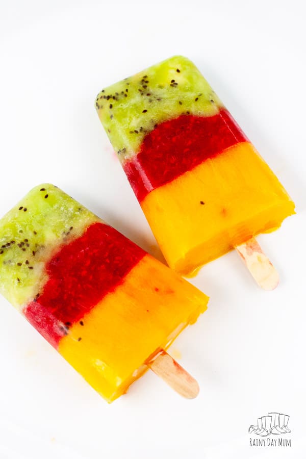kiwi, raspberry and mango layered and frozen into a delicious fruit summer ice lolly