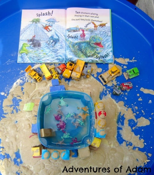 Dinosaur small world play connect and play with the children's storybook Dinosaur Dig! using Kinetic Sand