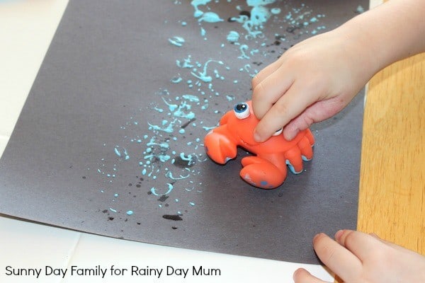 Printing and painting with toys to create under the sea pictures bringing alive the storybook Pout Pout Fish