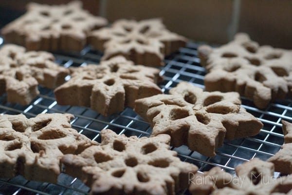 Gingerbread Snowflake Cookies cooling on a cookie wrack