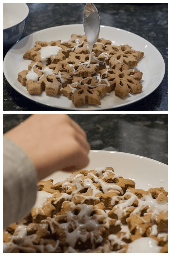 preschooler decorating gingerbread cookies in the shape of snowflakes