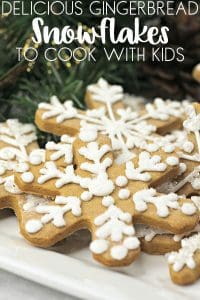Plate of Gingerbread Snowflakes made with this easy Christmas Cookie Recipe perfect to cook with kids