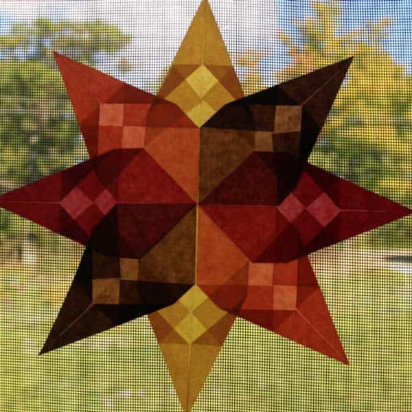 Easy beginner origami project to create a beautiful fall window star using kite paper with full step by step instructions and picture guide.
