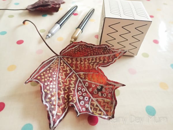 Turn leaf art into a practice on prewriting with this simple fall based activity for toddlers and preschoolers to create beautiful leaf art patterns.