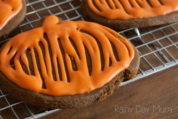 close up of a delicious halloween pumpkin gingerbread cookie that the kids can bake