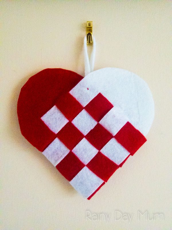 Create your own Scandinavian Woven Heart Ornament to decorate the or home or tree. Follow these simple instructions for a little Hygge in your home.