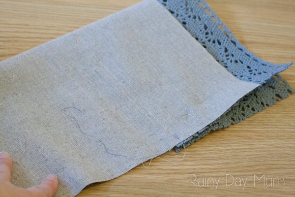 Easy sewing project for beginners using a machine to create a Rustic Stocking that can be hung to decorate the home at Christmas. Full tutorial!