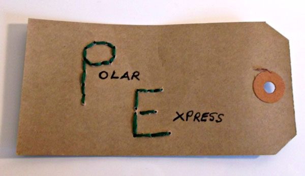 Create your own Polar Express Train Ticket Craft with this simple tutorial on making your own jingling ticket for Christmas Crafting Fun for Kids.