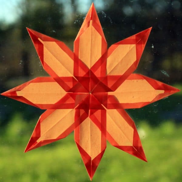 Make this beautiful Kite Paper Window Star that looks like a flower to decorate your home or classroom this summer made with origami folds.