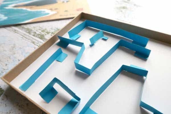 Create a fun and simple maze with kids that uses items from the recycling and junk modelling box as well as toys. Ideal to make and play with.