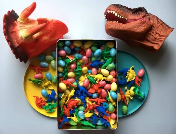 Create your own dinosaur game inspired by the classic children's game Hungry Hippo that works on fine motor and gross motor skills.