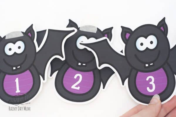 printable bats with numbers on for a fun maths activity for halloween.