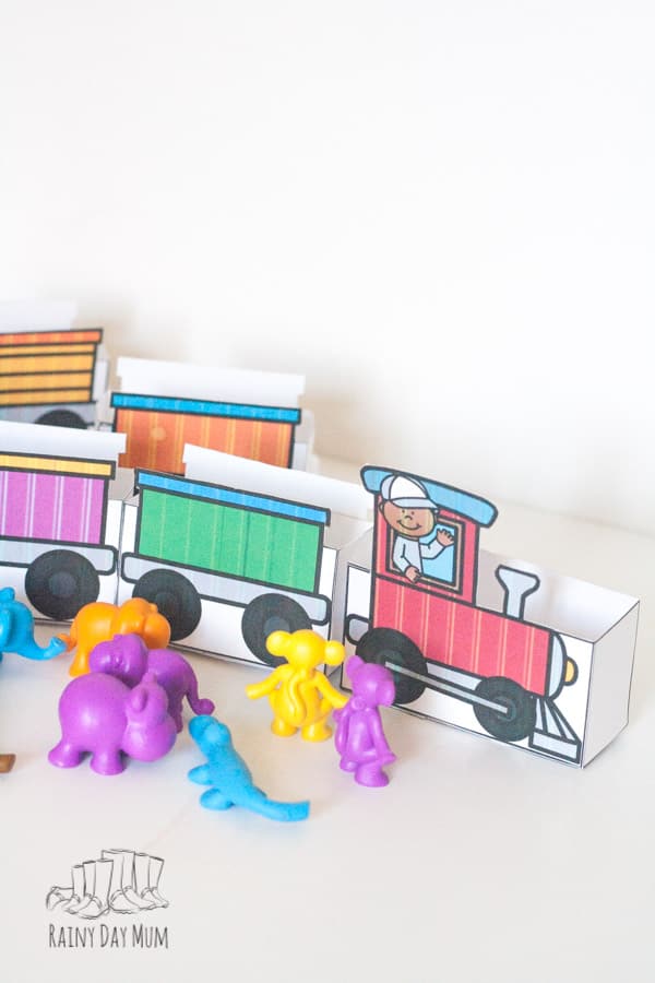 Create your own train and use it with counters to play this Freight Train by Donald Crews Inspired Counting Game ideal for toddlers and preschoolers.