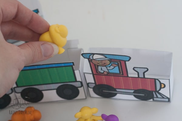 Create your own train and use it with counters to play this Freight Train by Donald Crews Inspired Counting Game ideal for toddlers and preschoolers.