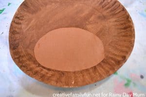 Paper Plate Rudolph - a fun Christmas Craft for Kids inspired by the story, song and movie Rudolph the Red-Nosed Reindeer.