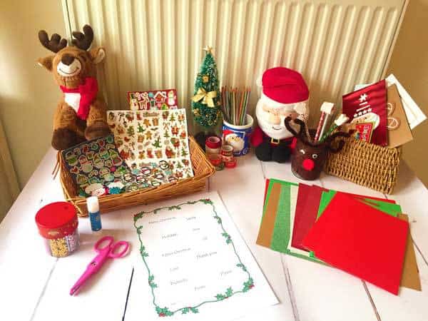 Christmas inspired art and craft activity for kids of different ages to do together. Full instructions on setting up your own Christmas Card Creation Station with ideas for resources to include.