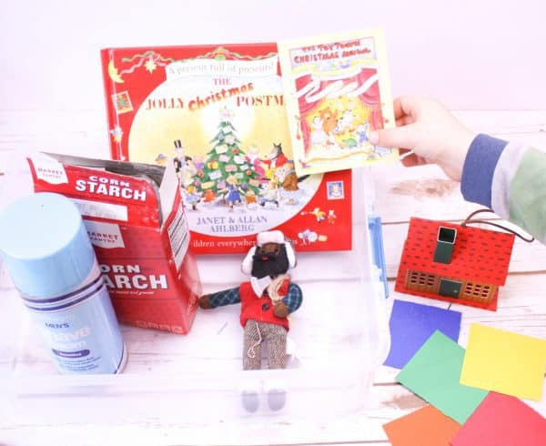 Full instructions on creating a Christmas Sensory Bin inspired by the classic children's Christmas book The Jolly Christmas Postman by Allan and Janet Ahlberg.