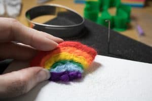 Step-by-step guide to creating a simple needle felted rainbow ideal as a beginner project and perfect for some spring or St Patrick's Day inspired crafting.
