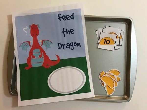 Simple math games for toddlers and preschoolers inspired by the fantastic children's storybook Dragons Love Tacos. Working on 1 to 1 correspondence feed the dragon the correct number of Tacos. Includes free printable.