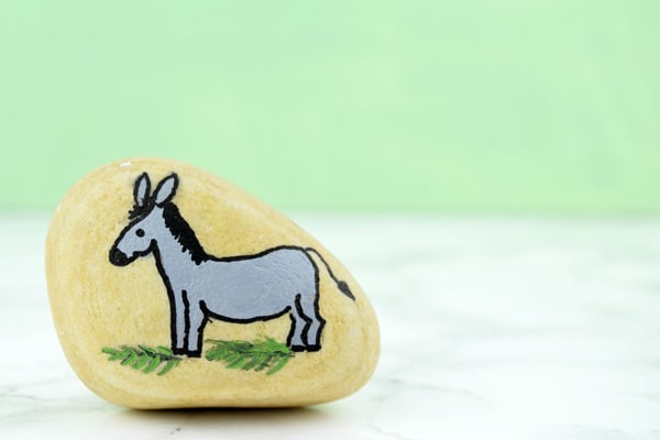 Make these easy Easter Story Stones to help teach your children about the meaning behind the Christian Celebration of Easter. Read aloud the story of Easter and then create and use these simple stones to retell the story.