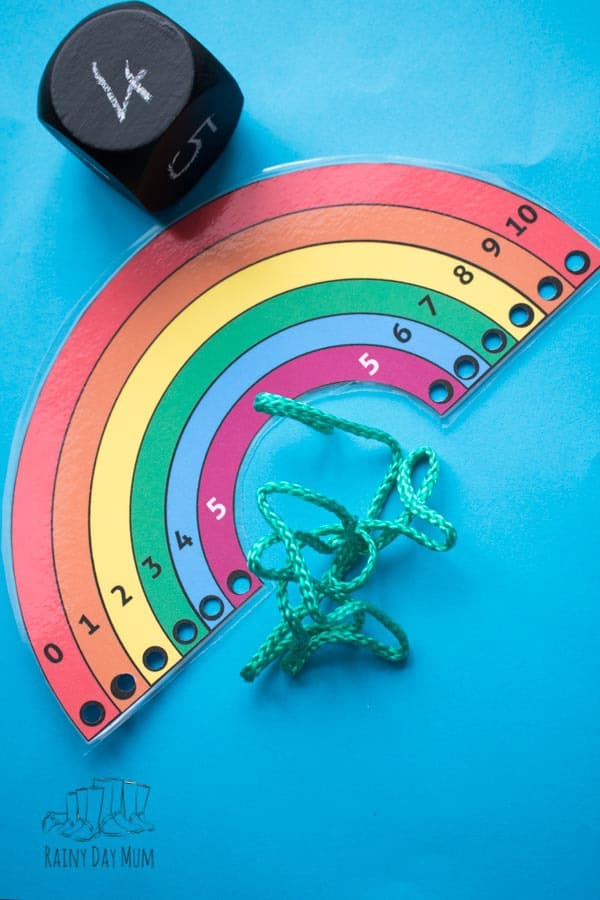 Work on reinforcing number bonds to 10 with this rainbow lacing activity including free printable lacing rainbow. Perfect for helping with number sense and mental arithmetic by getting hands-on learning of the basic number facts.