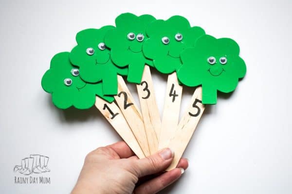 a set of 5 little shamrock puppets hand made to use whilst singing st patrick's day songs and rhymes