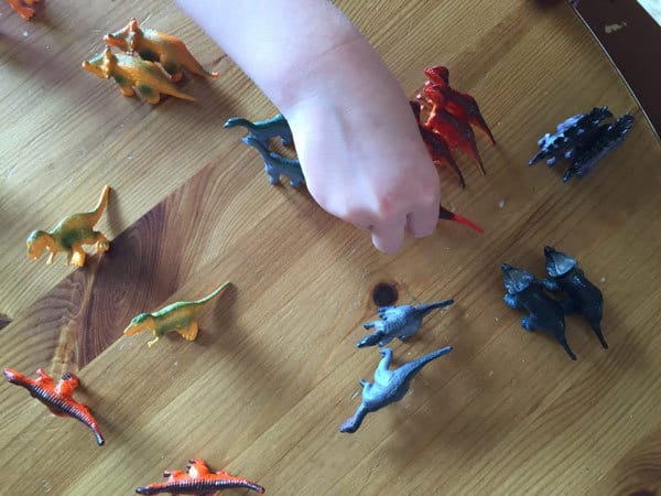 toy dinosaur sorting activity for toddlers
