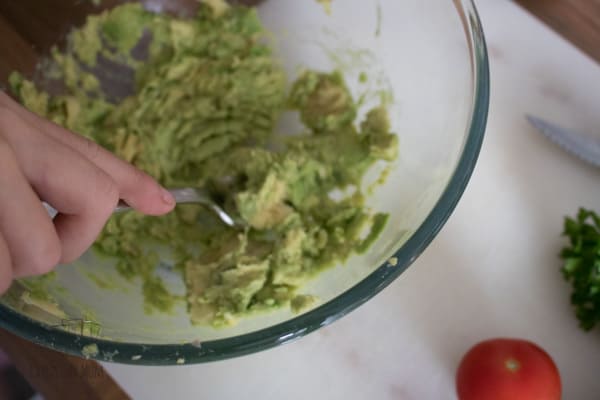 A simple recipe for guacamole that is so easy that kids and you can cook together.
