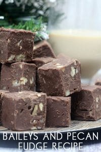 Delicious Baileys Irish Cream Fudge Recipe with chopped peanuts served on a tray for Christmas with a glass of Baileys Behind