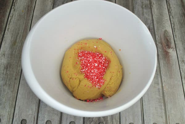 Adding sprinkles to cookie ideal. These are peppermint flavour and perfect for Christmas Cookies