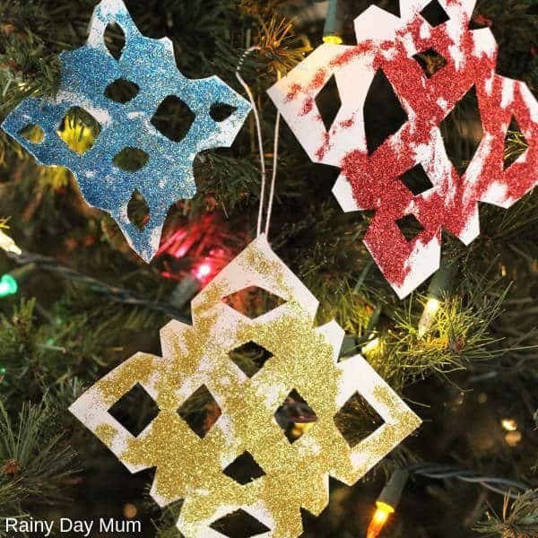 Easy Christmas Craft for Kids to create Simple Glitter Snowflakes inspired by the ones in Merry Christmas Mouse! Quick Craft to do on a Rainy Christmas Day