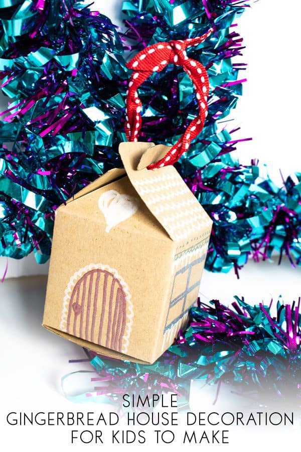 Simple Gingerbread House Decorations for Kids to Make with a free printable template to create the ornament to hang on the tree.