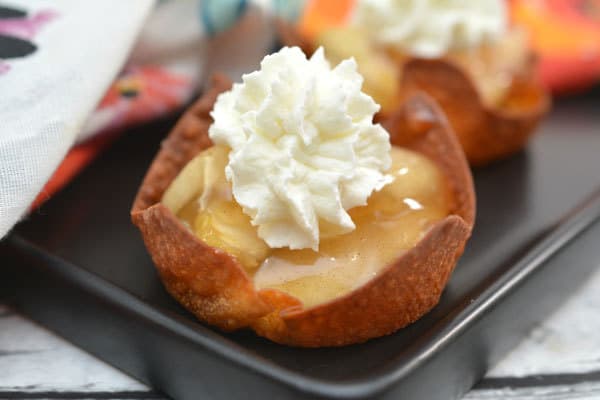 Squirty cream topped apple pie cups for simple bite-sized desserts for Rainy Days