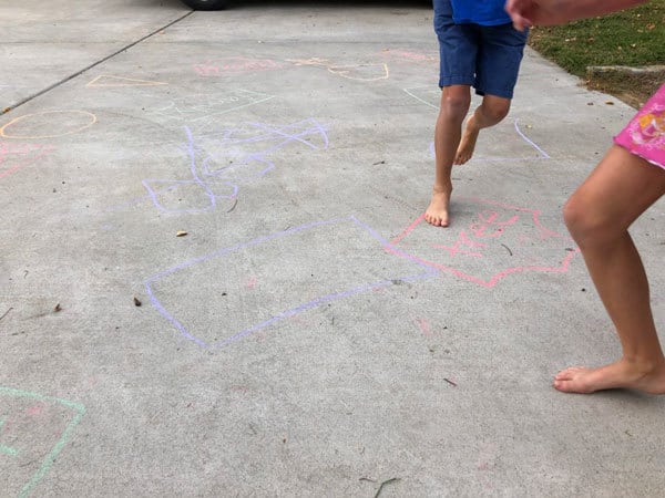 kids playing simple gross motor game inspired by Aliens love Panta Claus