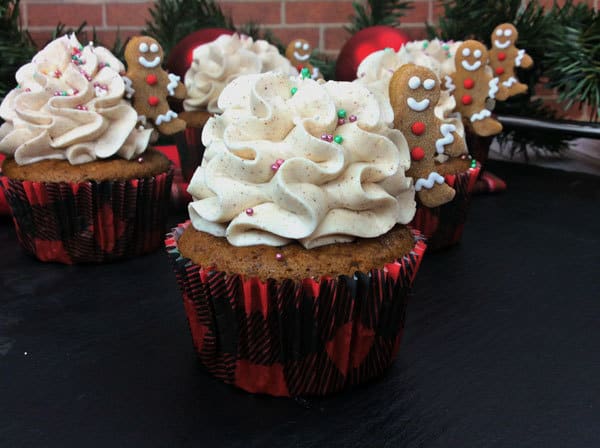 Tasty Gingerbread Cupcakes with mini gingerbread men and a cinnamon buttercream icing for Christmas Party Cakes