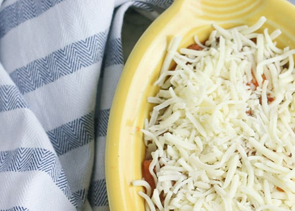 Sprinkle with grated mozzarella cheese for a bubbling topping for homemade lasagna ready in just 30 minutes