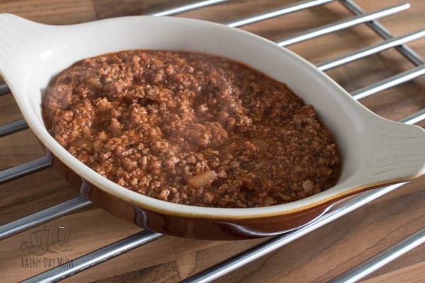 tomato based shepherds pie mix in a oven dish