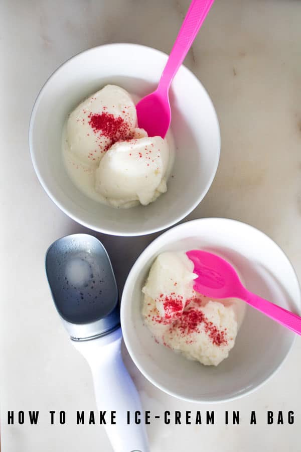 image of ice-cream made by kids in a bag with bright pink spoons text reads How to Make Ice-Cream in a Bag